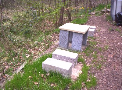 Close up of the stone table and hive supports.