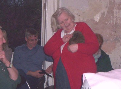 Barbara shows off her oldest resident,a common UK hedgehog.